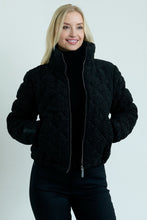 Load image into Gallery viewer, Woman wearing a black jacket on a white background
